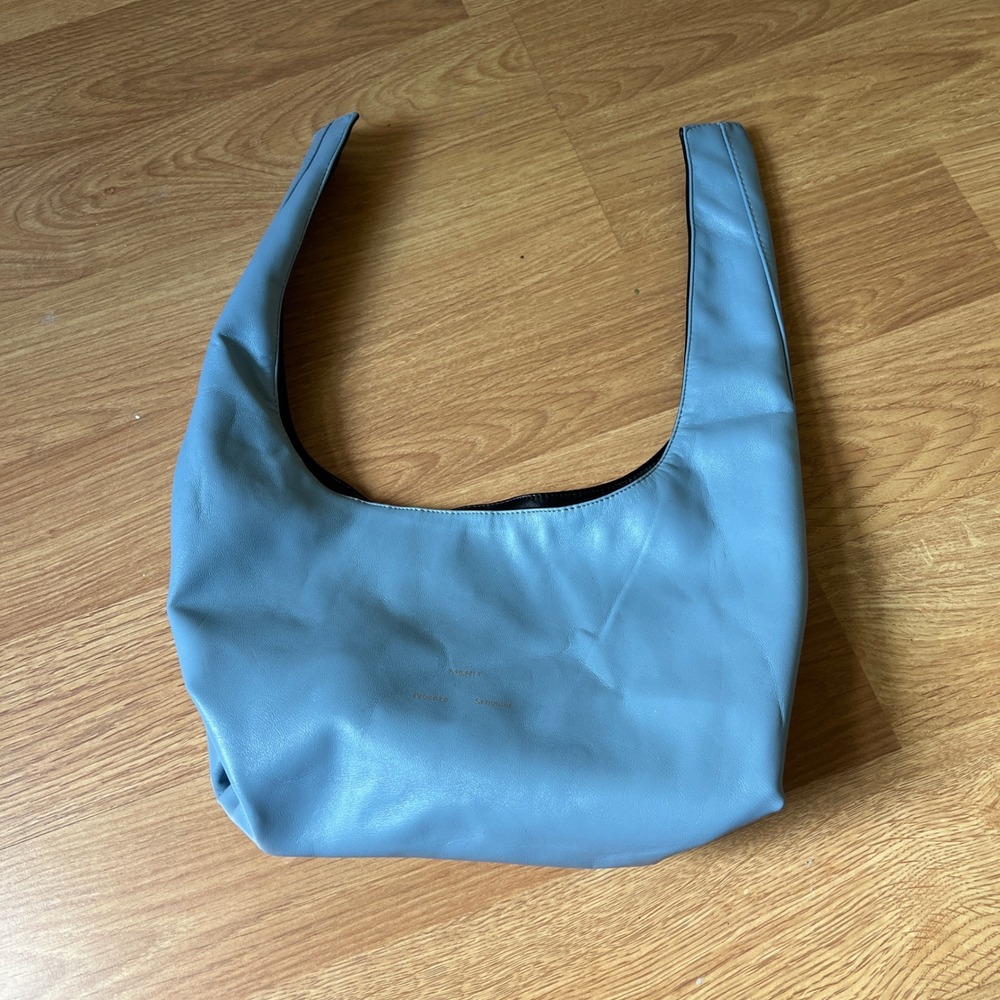 Merit x Proenzaโ Schouler Reversible Vegan Leather Makeup Bag Black Blue Gold